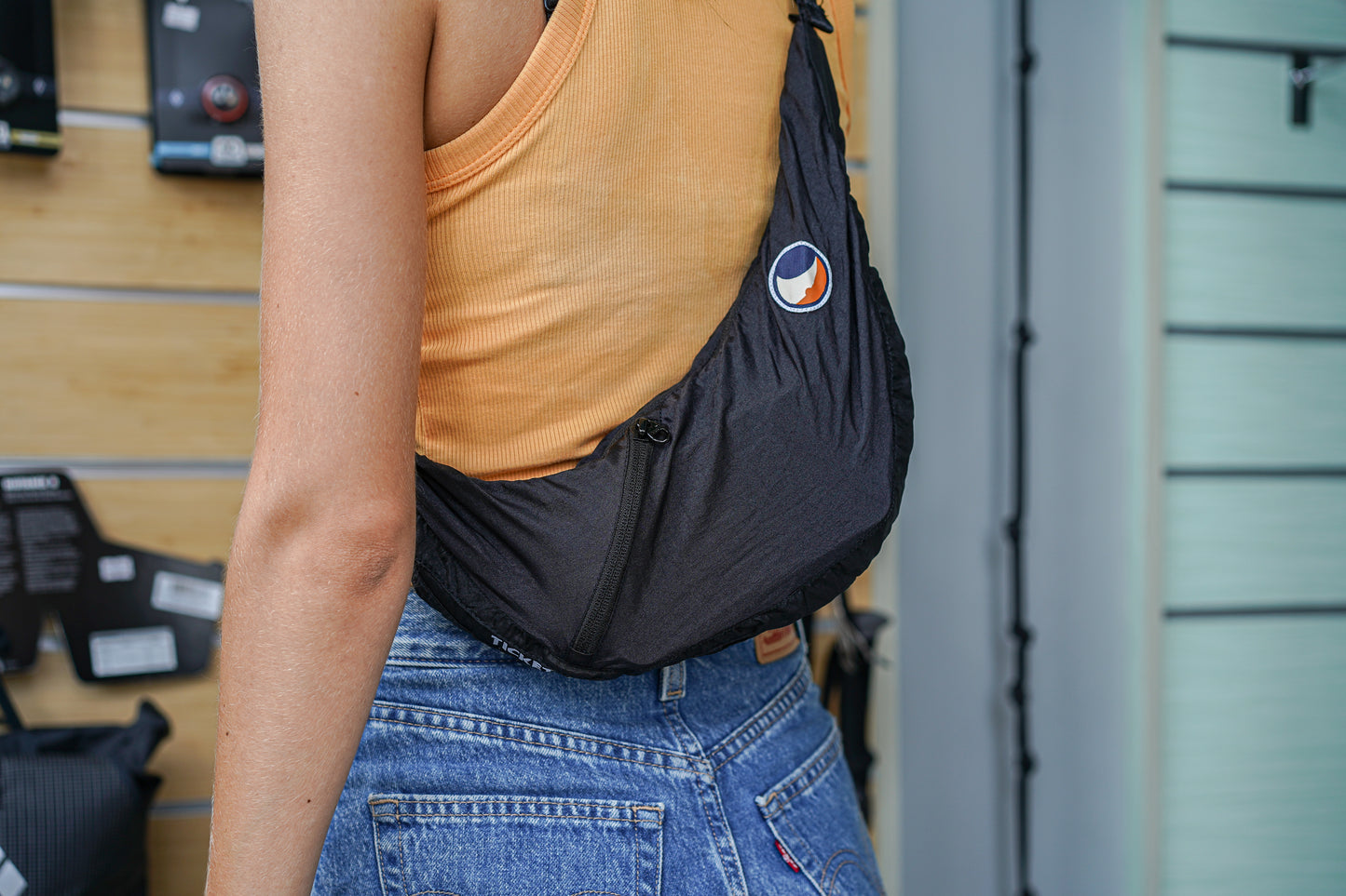 TICKET TO THE MOON UPCYCLED SLING BAG